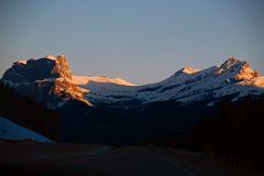 34 Castle Mountain, Stuart Knob, Helena Peak and Helena Ridge Sunrise From Trans Canada Highway Driving Between Banff And Lake Louise in Winter.jpg